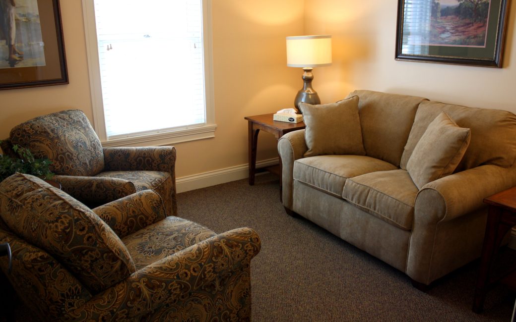 counseling room with brown furniture