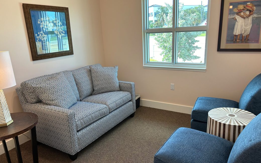 Naples counseling room with navy furniture