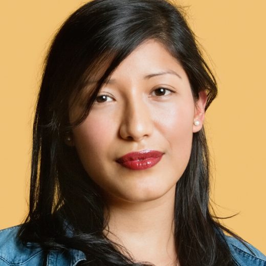 woman with black straight hair and red lipstick