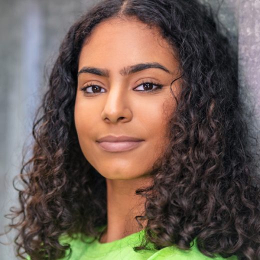 woman with brown curly hair