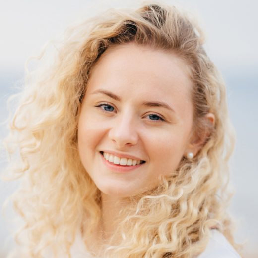 woman with blonde curly hair