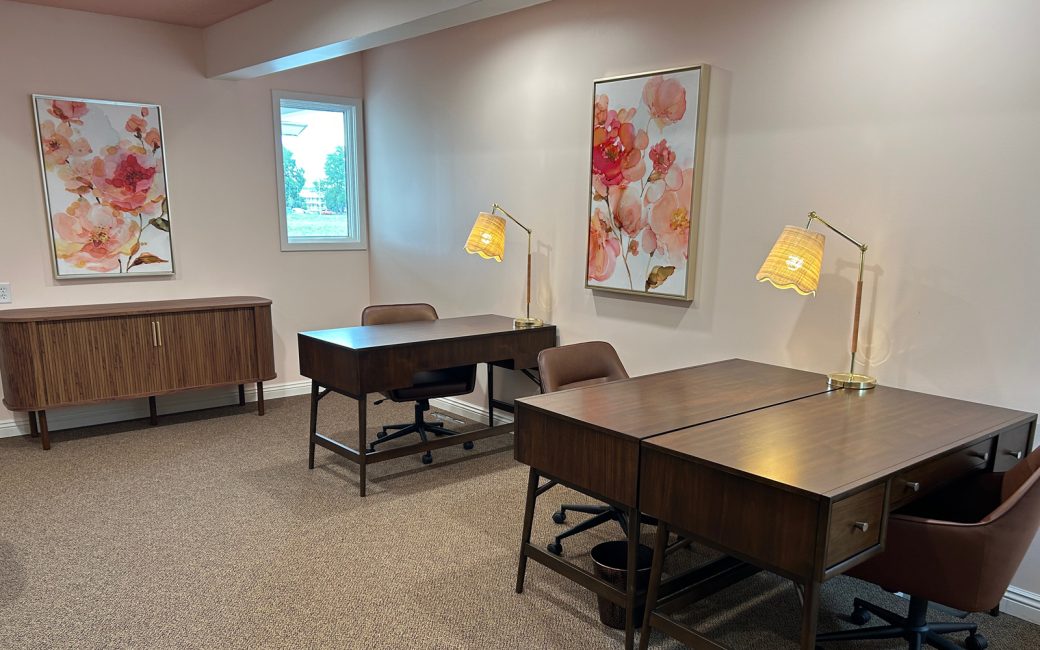 quiet work area with desks and lamps